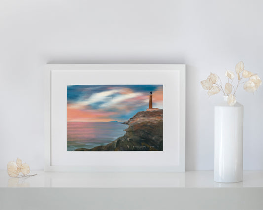 Sunset at the Lgihthouse Framed Print